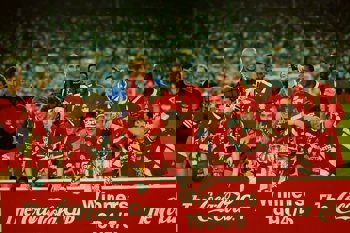 Squad Photo With The Trophy